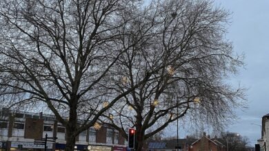 A street junction in Warwick town centre at dusk in December