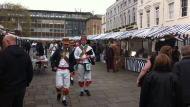 Morris dancers and market stalls in Warwick Market Place